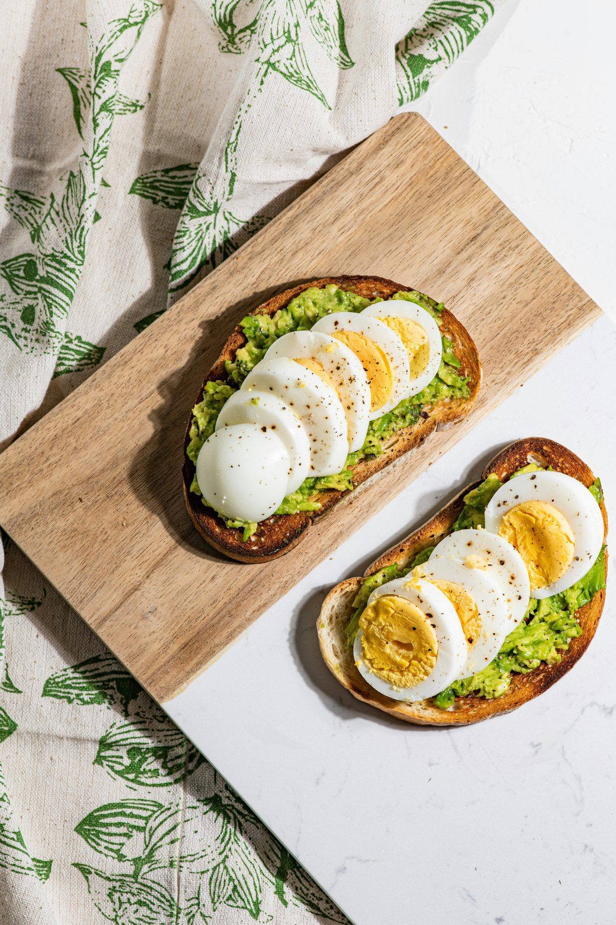 Avocado and boiled egg on wholegrain toast.
