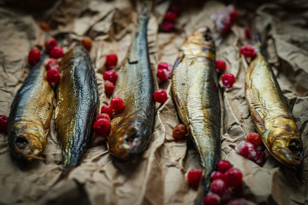 Oily fish and fresh berries, foods rich in omega-3 fats and antioxidants.