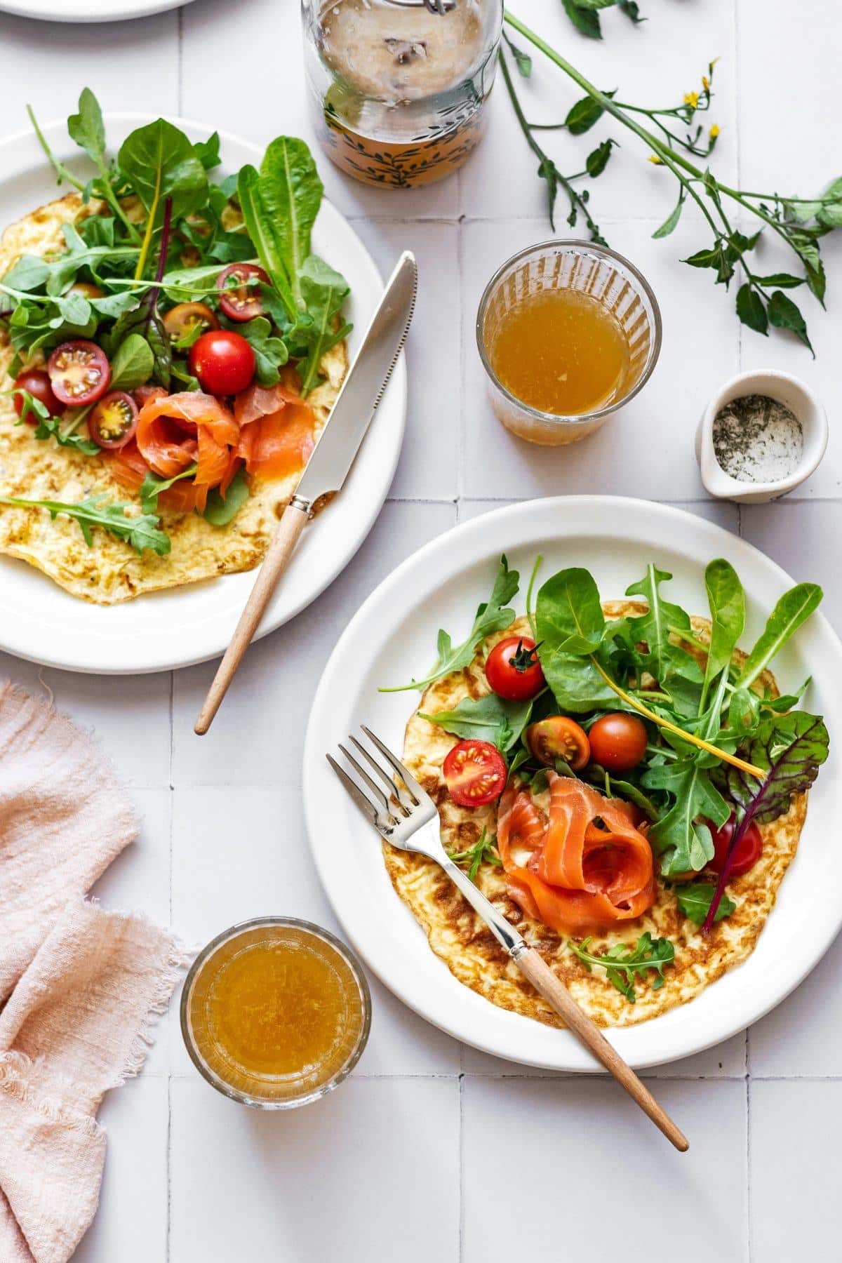 A nourishing brunch of eggs, smoked salmon and fresh salad.