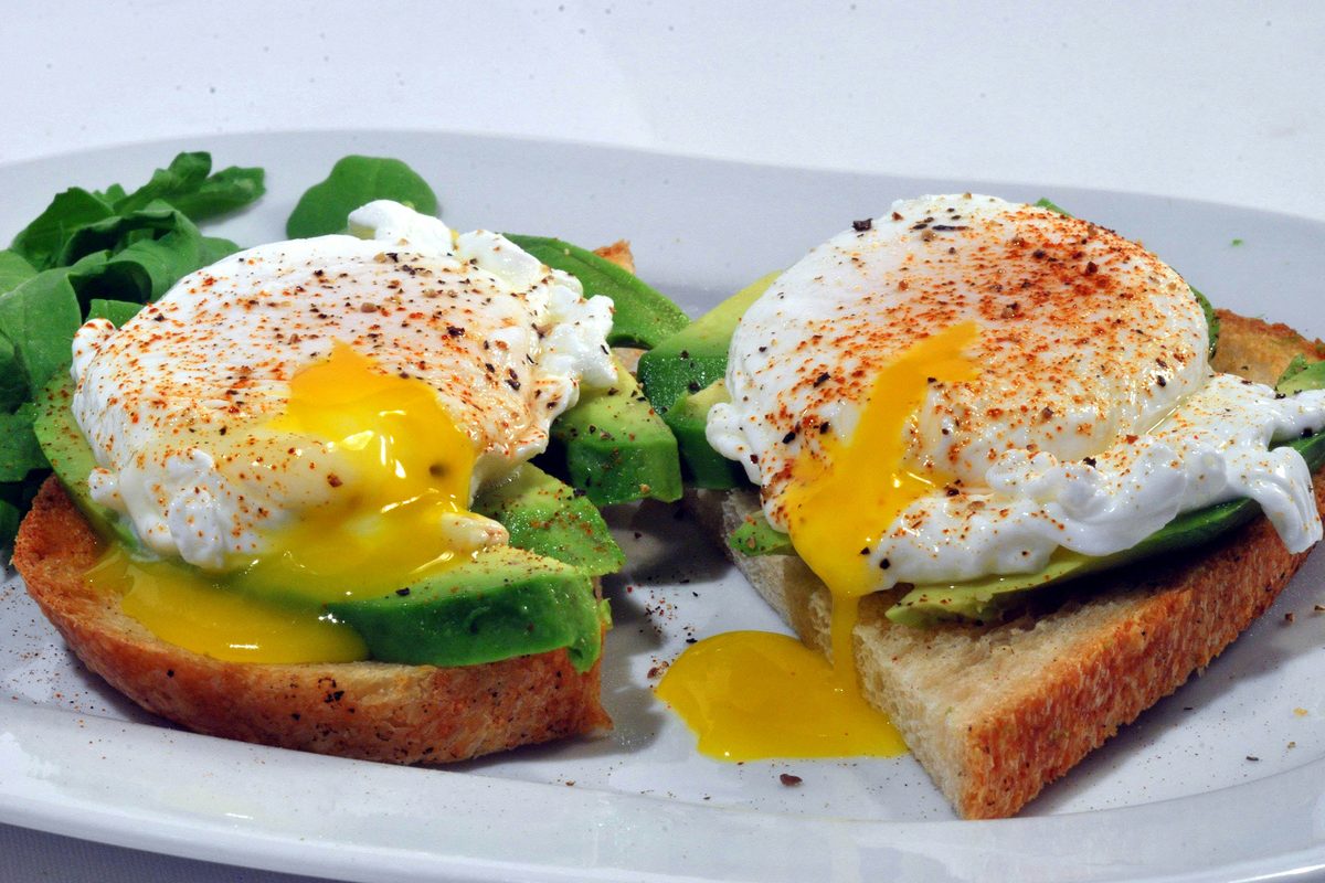 Poached eggs and avocado on wholegrain toast.